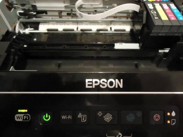 Что делать, если на принтере горит красная лампочка: epson, samsung, kyocera, canon, ricoh, xerox